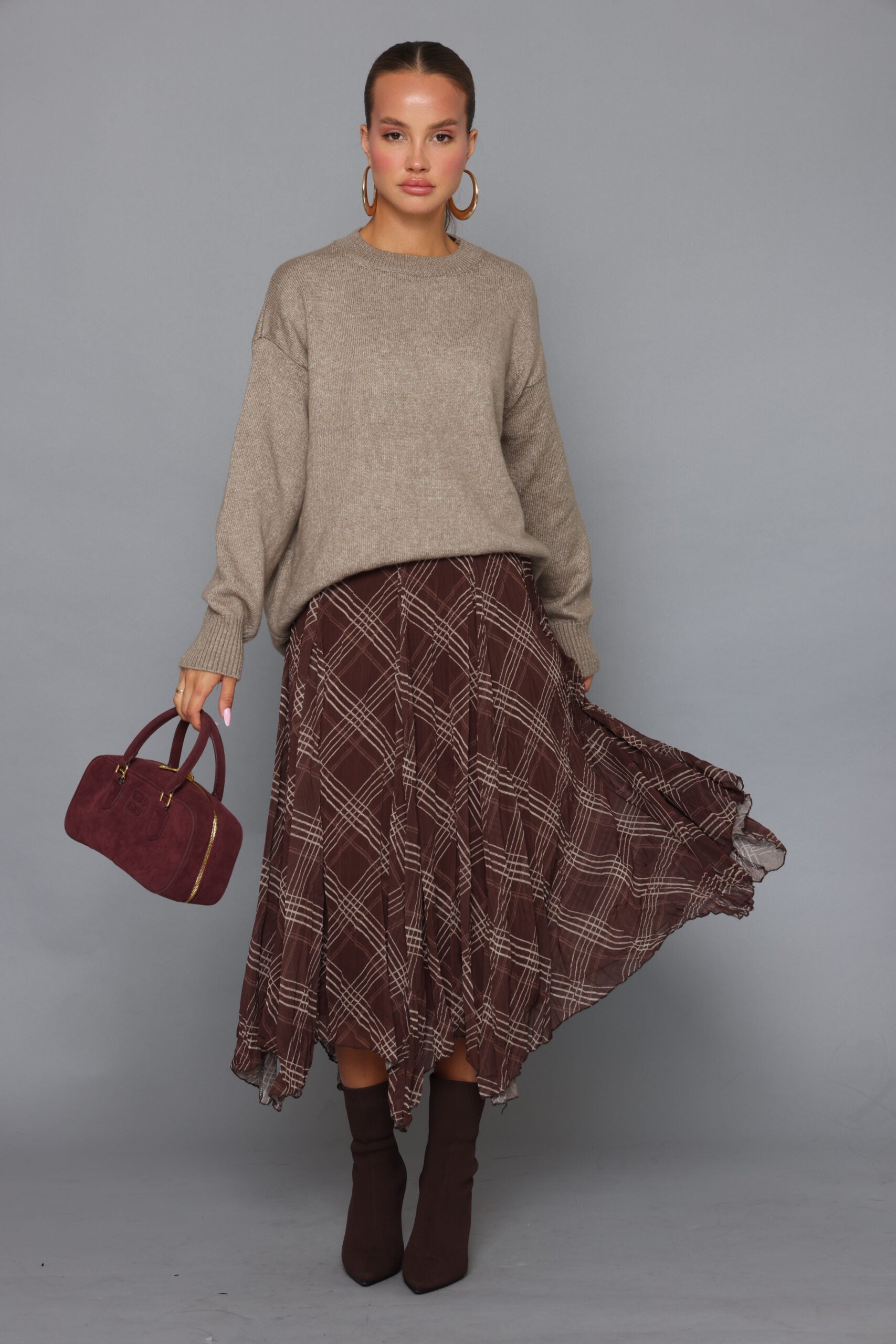 חצאית שיפון משבצות בסיום שפיצים