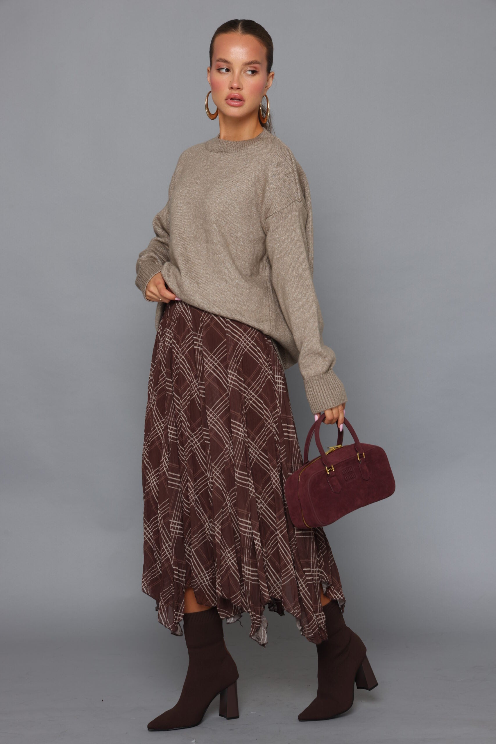 חצאית שיפון משבצות בסיום שפיצים